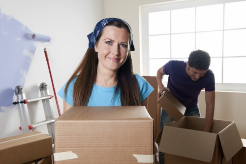 Moving crew loading household items for a local removal in St Margarets