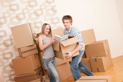 Loading furniture into a moving truck in St Margarets